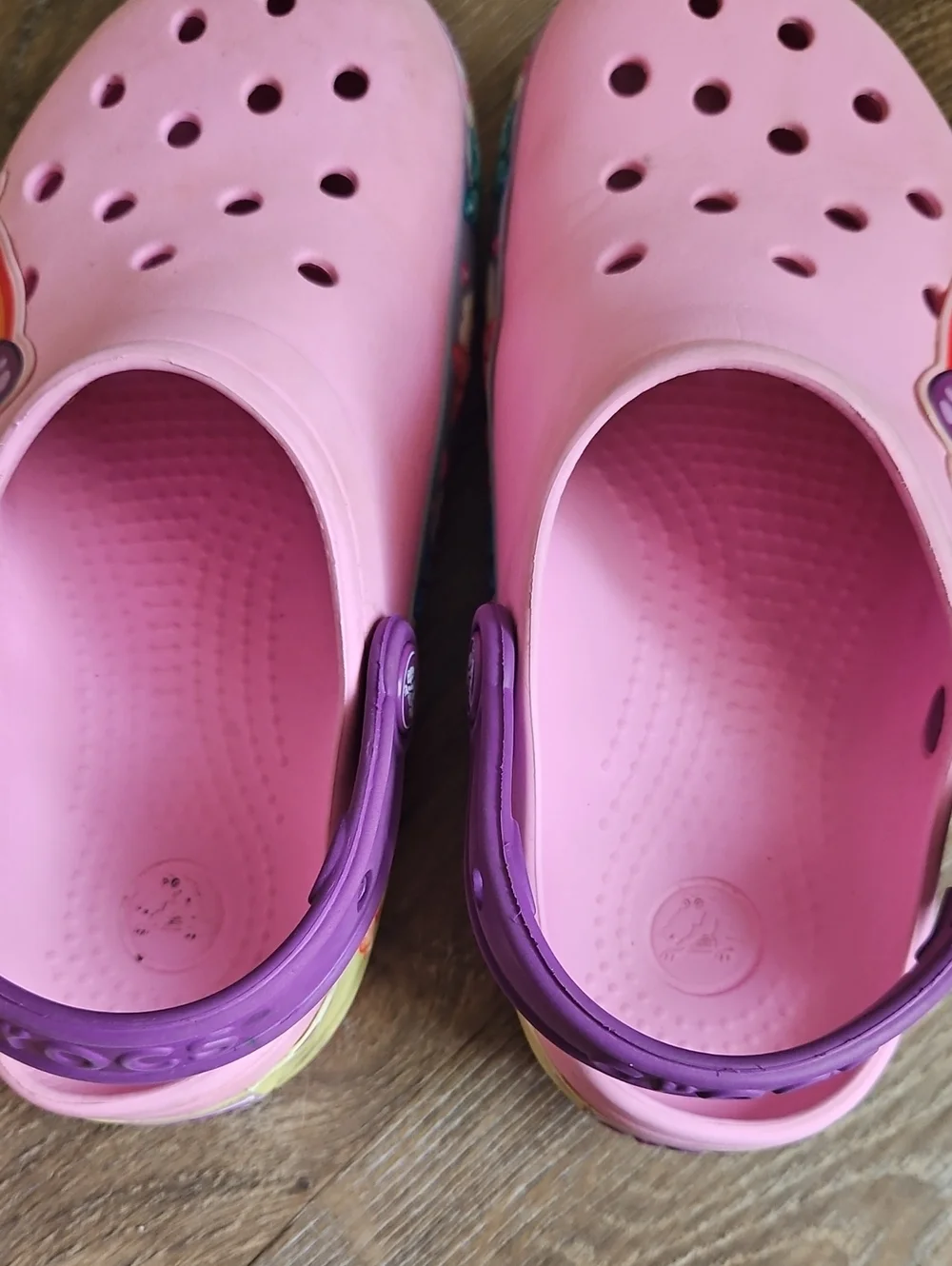 CROCS Pink Clog Sandals with Purple Heel Strap Rainbow and butterfly design